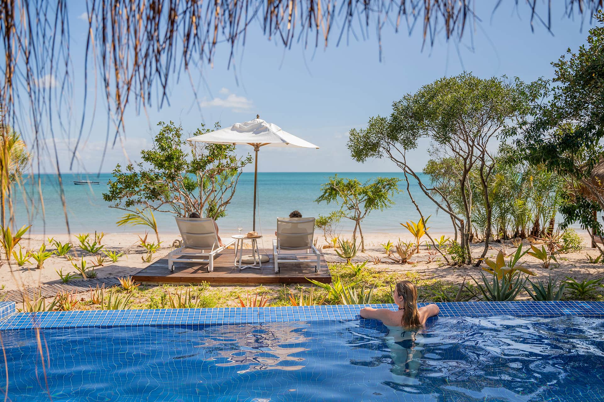 The infinity pool right on the beach at Azura Benguerra Island in Mozambique