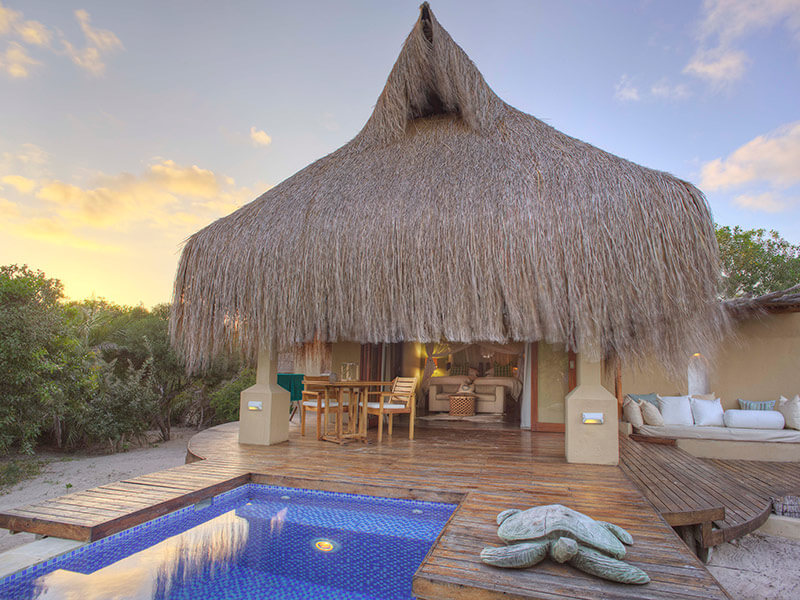 private pool and deck outside at Azura Benguerra lodge in Mozambique