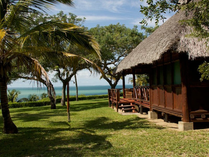 thatched wooden lodge exterior at Archipelago Resort in Mozambique
