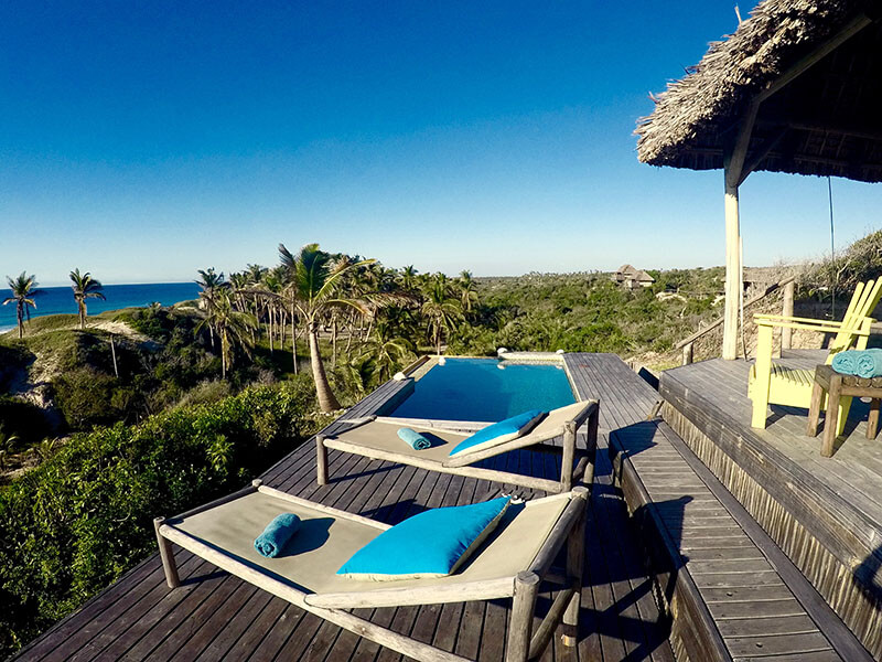 Private outside pool and sunbeds on the deck overlooking the sea views at Travessia Beach Lodge in Mozambique