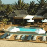 aerial view of the pool and deck next to the lodge at Eclectic Beach retreat in Mozambique