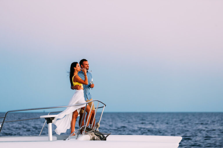 Couple watching the sunset on a boat in Mozambique