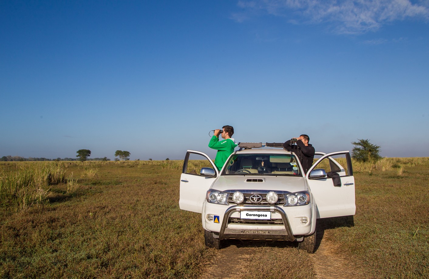 guests on a safari game drive in Gorongosa