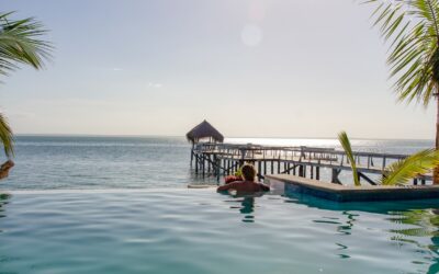 https://www.mozambiquetravel.com/wp-content/uploads/2023/09/Woman-pool-Dugong-Beach-Lodge-400x250.jpg