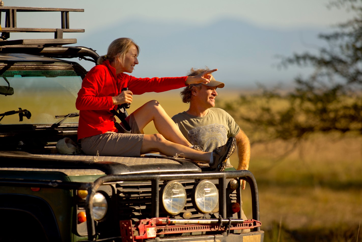 A couple viewing game on a safari in Gorongosa National Park in Mozambique